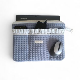 front-view-of-a-blue-waffle-weave-laptop-sleeve-with-a-decorative-ruffled-edged-front-pocket-with-the-brand-name-max-&-milo-stitched-onto-the-front-of-the-sleeve