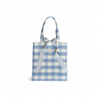 a-front-view-of-a-blue-gingham-max-&-milo-tote-bag-with-a-blue-floral-bow-tie-closure
