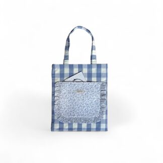 a-front-view-of-a-max&milo-blue-gingham-tote-bag-with-a-blue-floral-frilled-front-pocket
